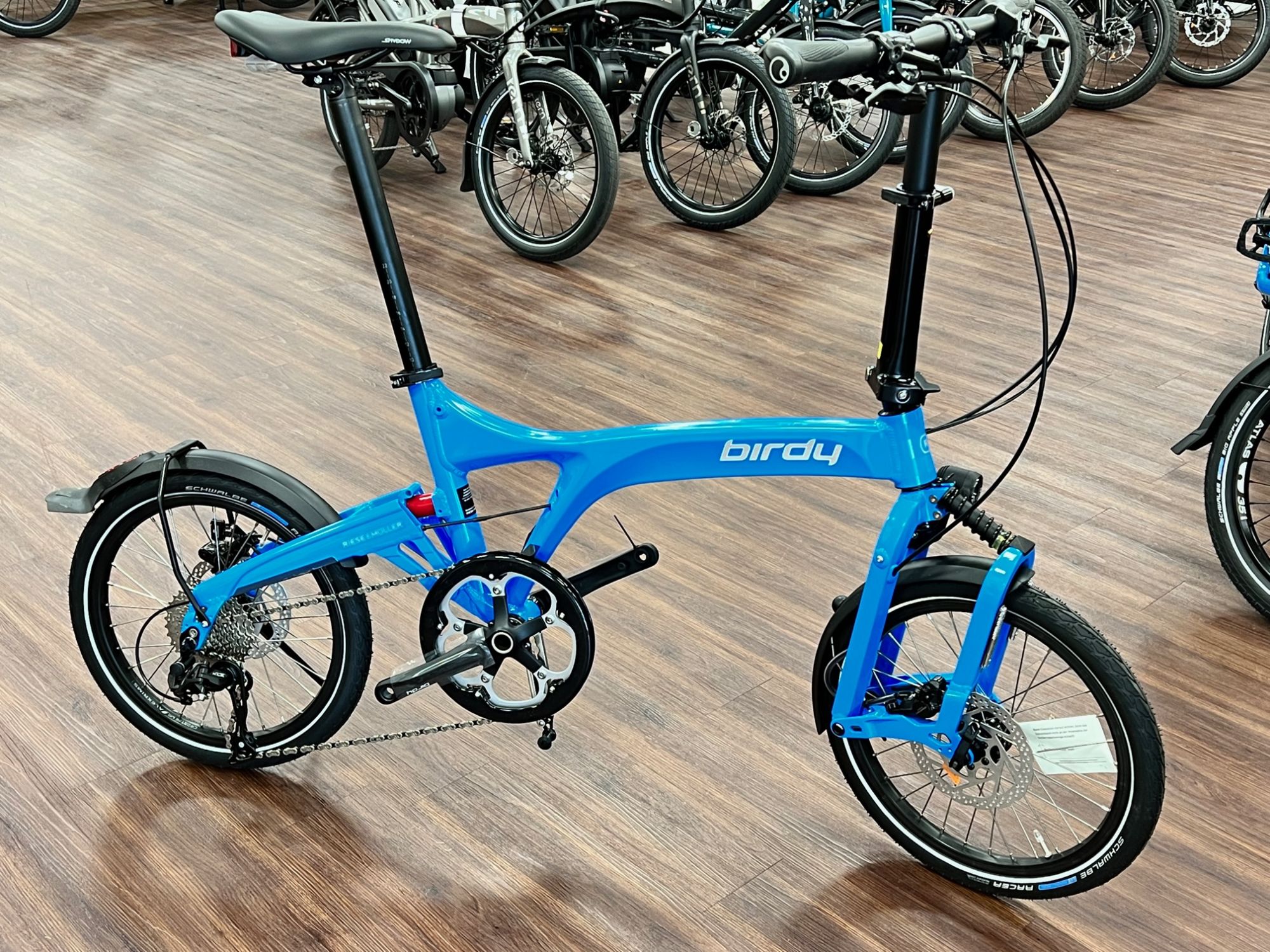 Birdy Touring Cyan Blau Sportvorbau mit Licht